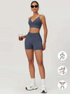 Maskert AirSoft Seamless Camisole Sports Two-Piece Set Urban Blue Holding coffee Full Body Pose