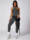Maskert Curve-Defining Halter Sports Jumpsuit Pants Lead Grey Front Full Body Pose
